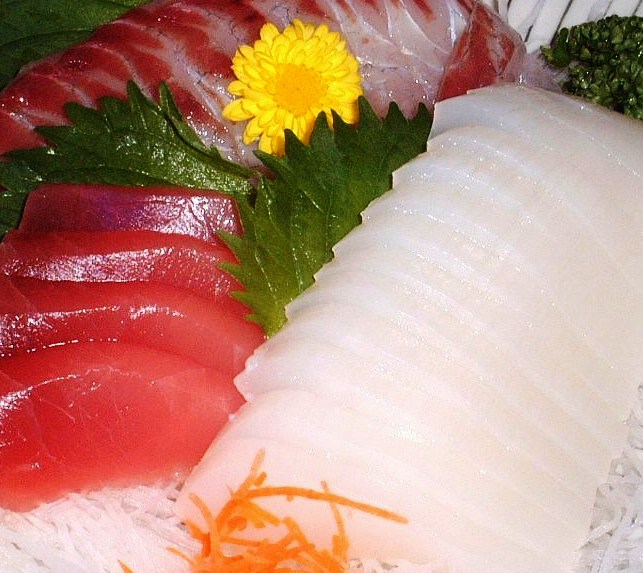 Tuna, cuttlefish, raw fish Sashimi, traditional Japanese seafood dish